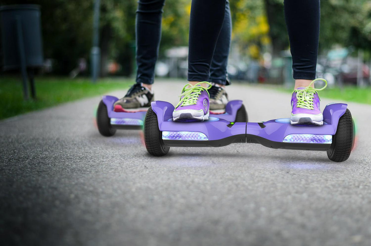 Voyager HoverBeam Purple Hoverboard with Light-up Wheels and Footboard. 185lb limit.