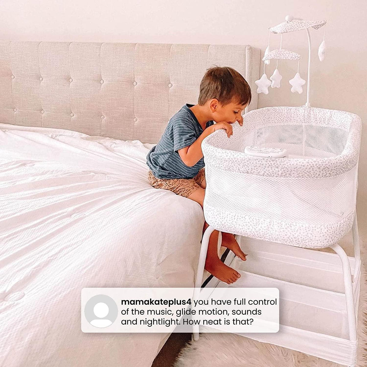 Delta Children SmartSleep Auto Glide Bassinet with Bluetooth. Alloy