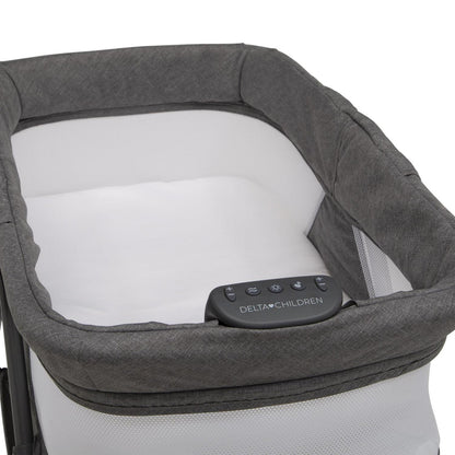 Delta Children TravelMate Compact Fold Bassinet - Features Lights. Sounds and Vibration. Grey Tweed
