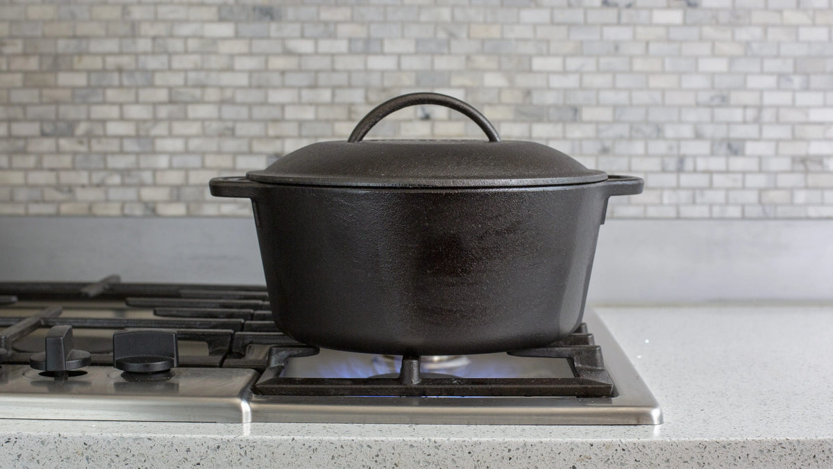 Lodge Pre-Seasoned 5 Quart Cast Iron Dutch Oven with Loop Handles and Cast Iron Cover