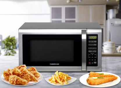 Farberware Countertop Microwave Ov 1100 Watts, 2.2 cu ft - Smart Sensor With LED Lighting and Child Lock - Perfect for Apartments and Dorms - Easy Clean Black Interior, Stainless Steel