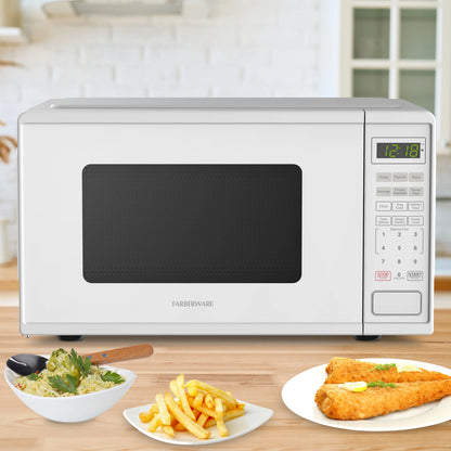 Farberware Countertop Microwave Ov 1100 Watts, 2.2 cu ft - Smart Sensor With LED Lighting and Child Lock - Perfect for Apartments and Dorms - Easy Clean Black Interior, Stainless Steel