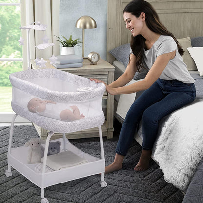 Delta Children SmartSleep Auto Glide Bassinet with Bluetooth. Alloy