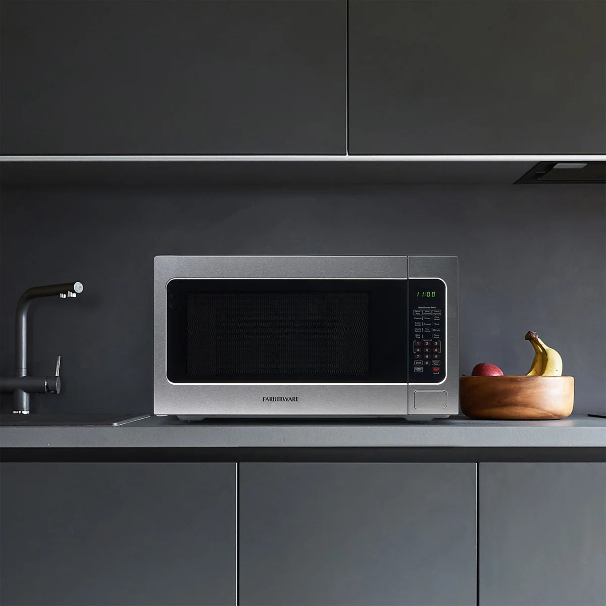 Farberware Countertop Microwave Ov 1100 Watts, 2.2 cu ft - Smart Sensor With LED Lighting and Child Lock - Perfect for Apartments and Dorms - Easy Clean Black Interior, Stainless Steel