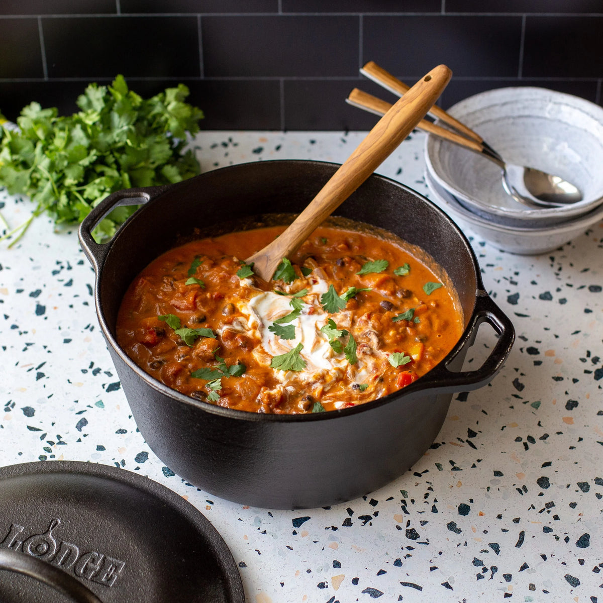 Lodge Pre-Seasoned 5 Quart Cast Iron Dutch Oven with Loop Handles and Cast Iron Cover