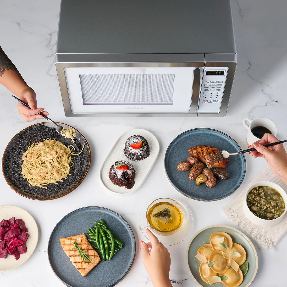 Farberware Stainless Steel Countertop Microwave Oven with Child Lock, 1.1 Cu Ft Black Stainless