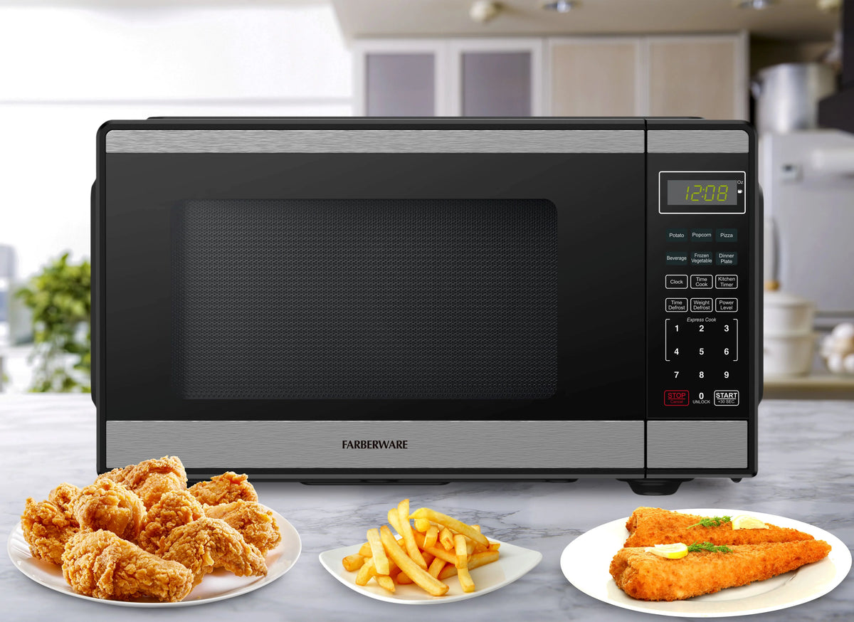 Farberware Countertop Microwave Ov 1100 Watts, 2.2 cu ft - Smart Sensor With LED Lighting and Child Lock - Perfect for Apartments and Dorms - Easy Clean Black Interior, Stainless Steel