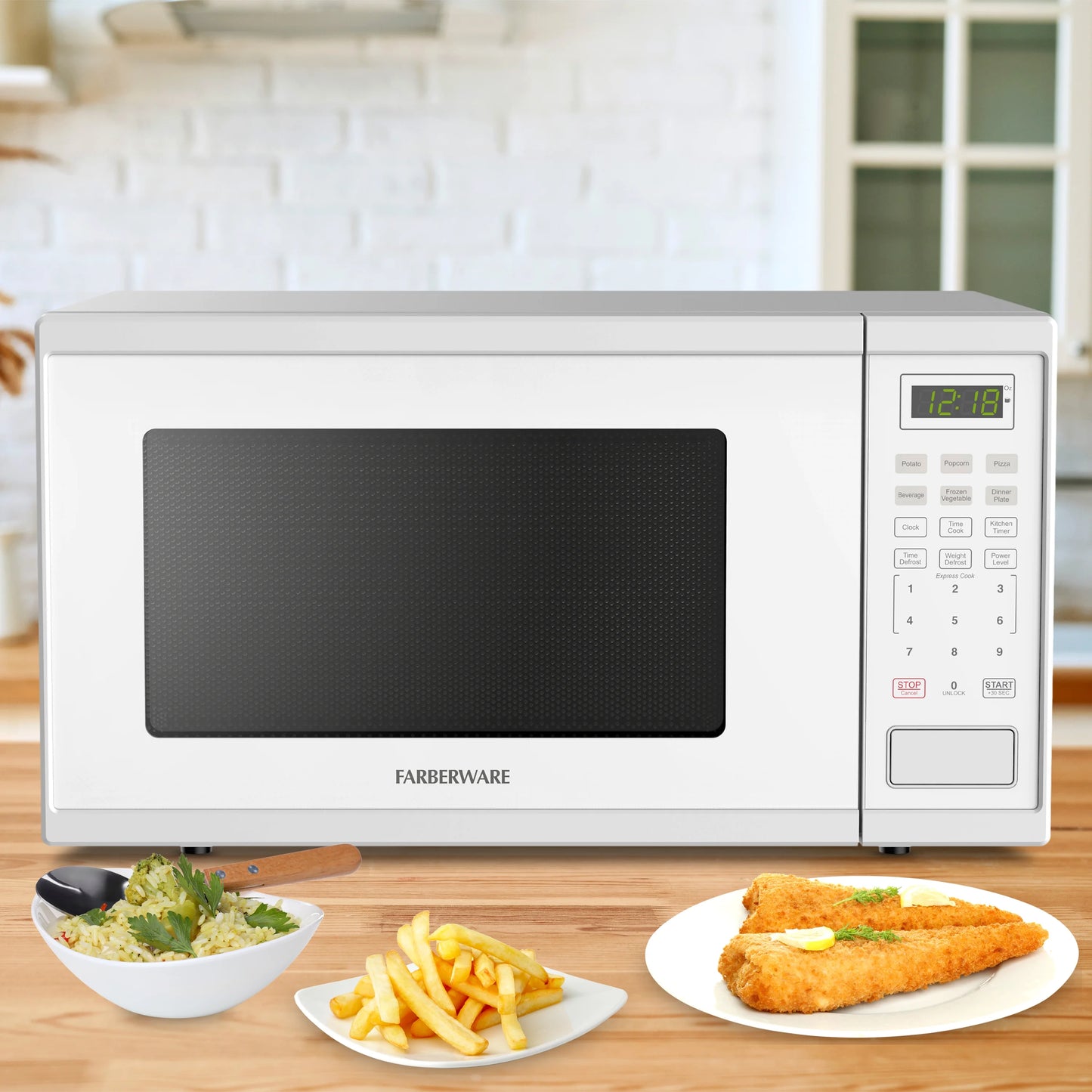 Farberware Countertop Microwave Ov 1100 Watts, 2.2 cu ft - Smart Sensor With LED Lighting and Child Lock - Perfect for Apartments and Dorms - Easy Clean Black Interior, Stainless Steel