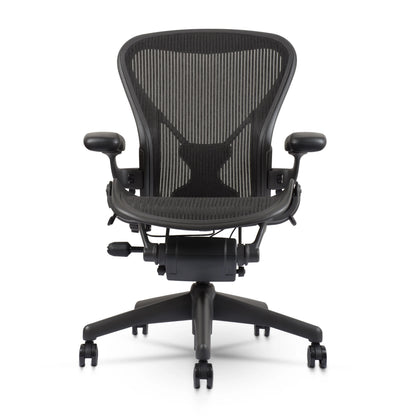 Herman Miller Aeron Chair Size B (𝙍𝙚𝙛𝙪𝙧𝙗𝙞𝙨𝙝𝙚𝙙) �?Fully Loaded PostureFit Clip‑Latch Adjustable Arms and 12‑Year Warranty along with 3 Yr Mechanical Warranty