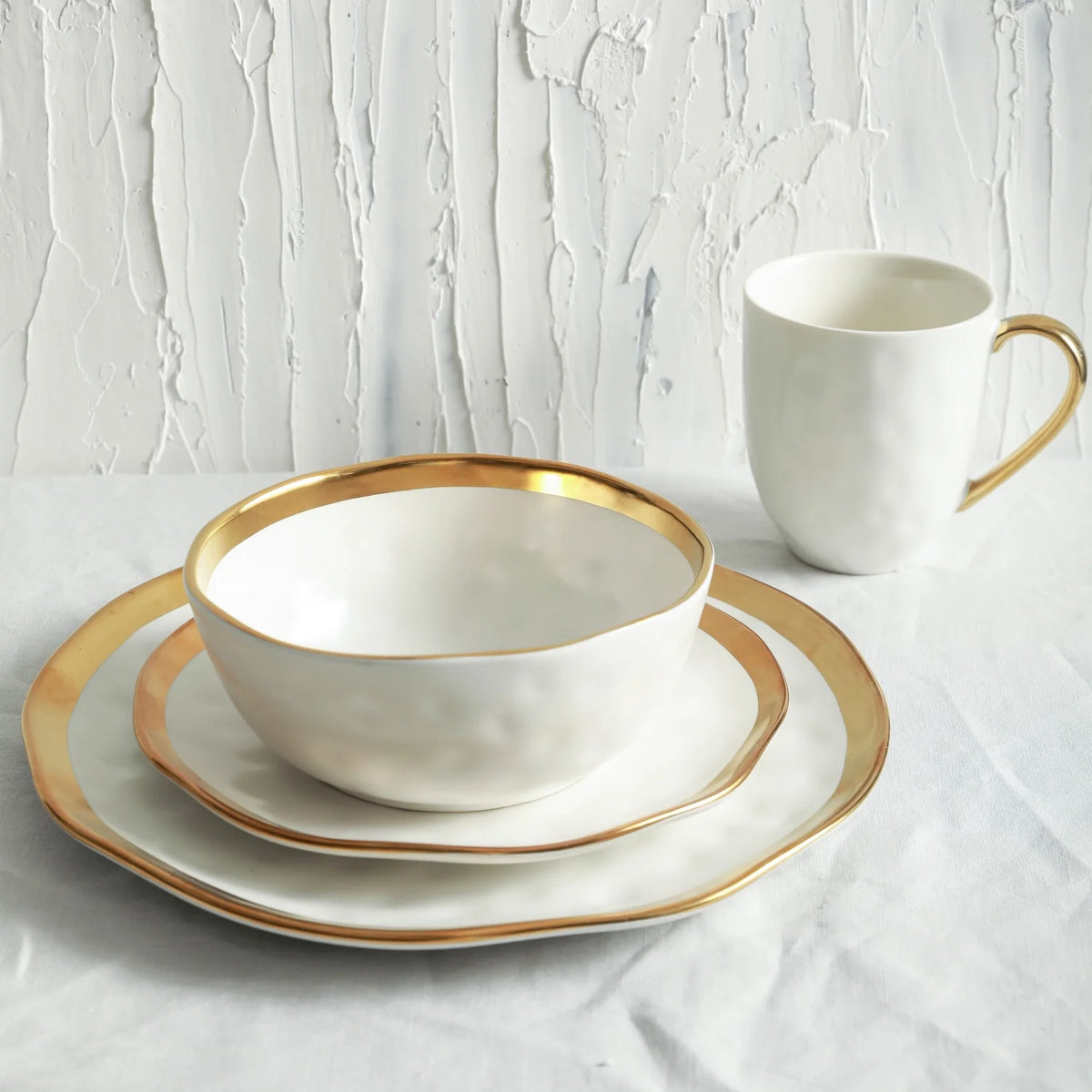 Stone Lain Florian Modern Porcelain Dish Set, 16-Piece Dishes for 4, Gold and Navy