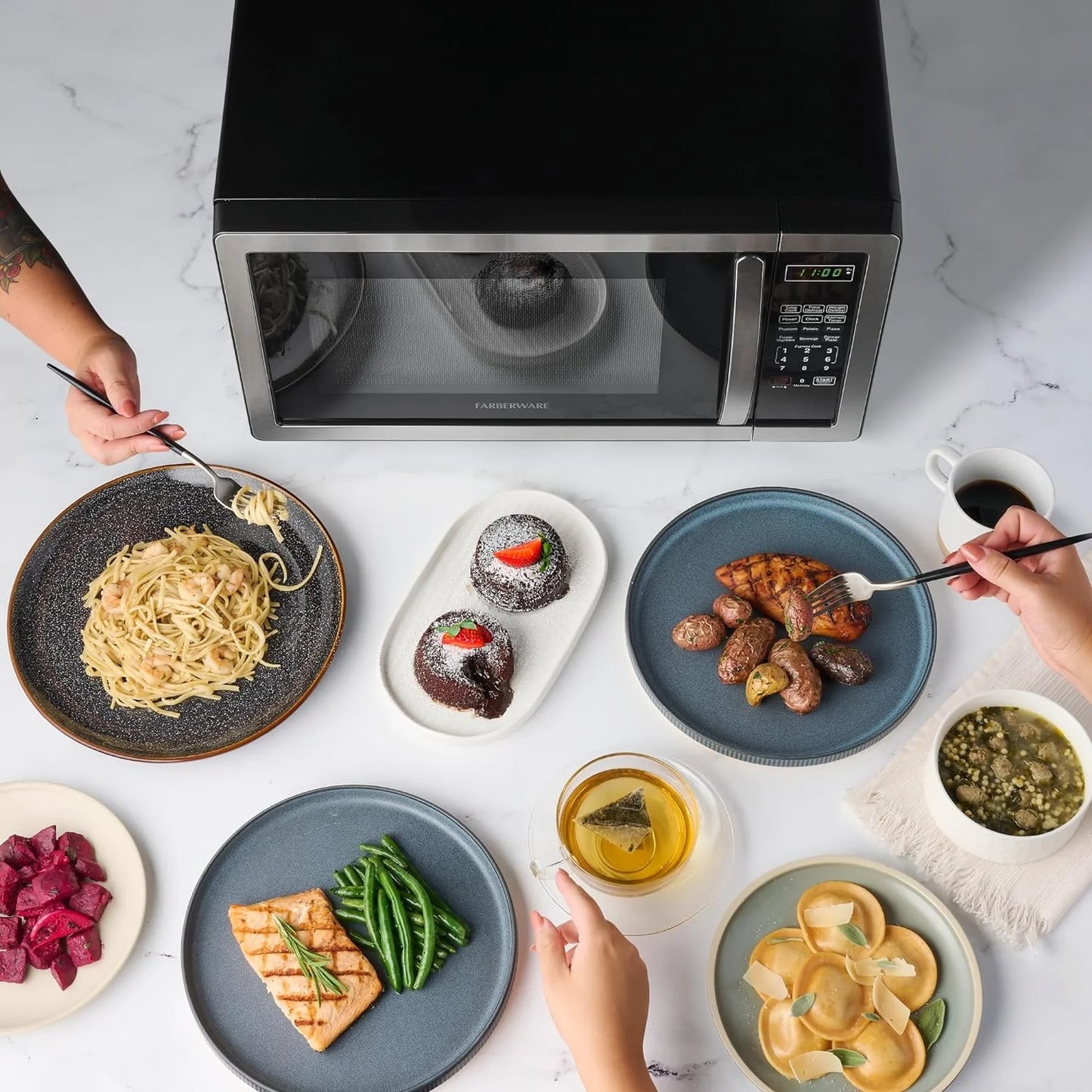 Farberware Stainless Steel Countertop Microwave Oven with Child Lock, 1.1 Cu Ft Black Stainless