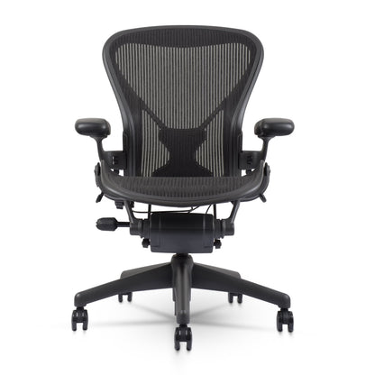 Herman Miller Aeron Chair Size B (𝙍𝙚𝙛𝙪𝙧𝙗𝙞𝙨𝙝𝙚𝙙) �?Fully Loaded PostureFit Clip‑Latch Adjustable Arms and 12‑Year Warranty along with 3 Yr Mechanical Warranty