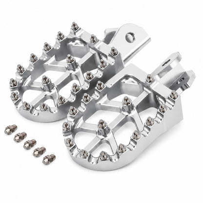 CNC aluminum foot pegs with replaceable steel traction pins for Surron Light Bee, Talaria Sting, CRF150F, and CRF230F motorcycles.
