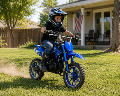 Kids riding a 49cc pit bike in a backyard near a suburban home in the USA while wearing proper safety gear.